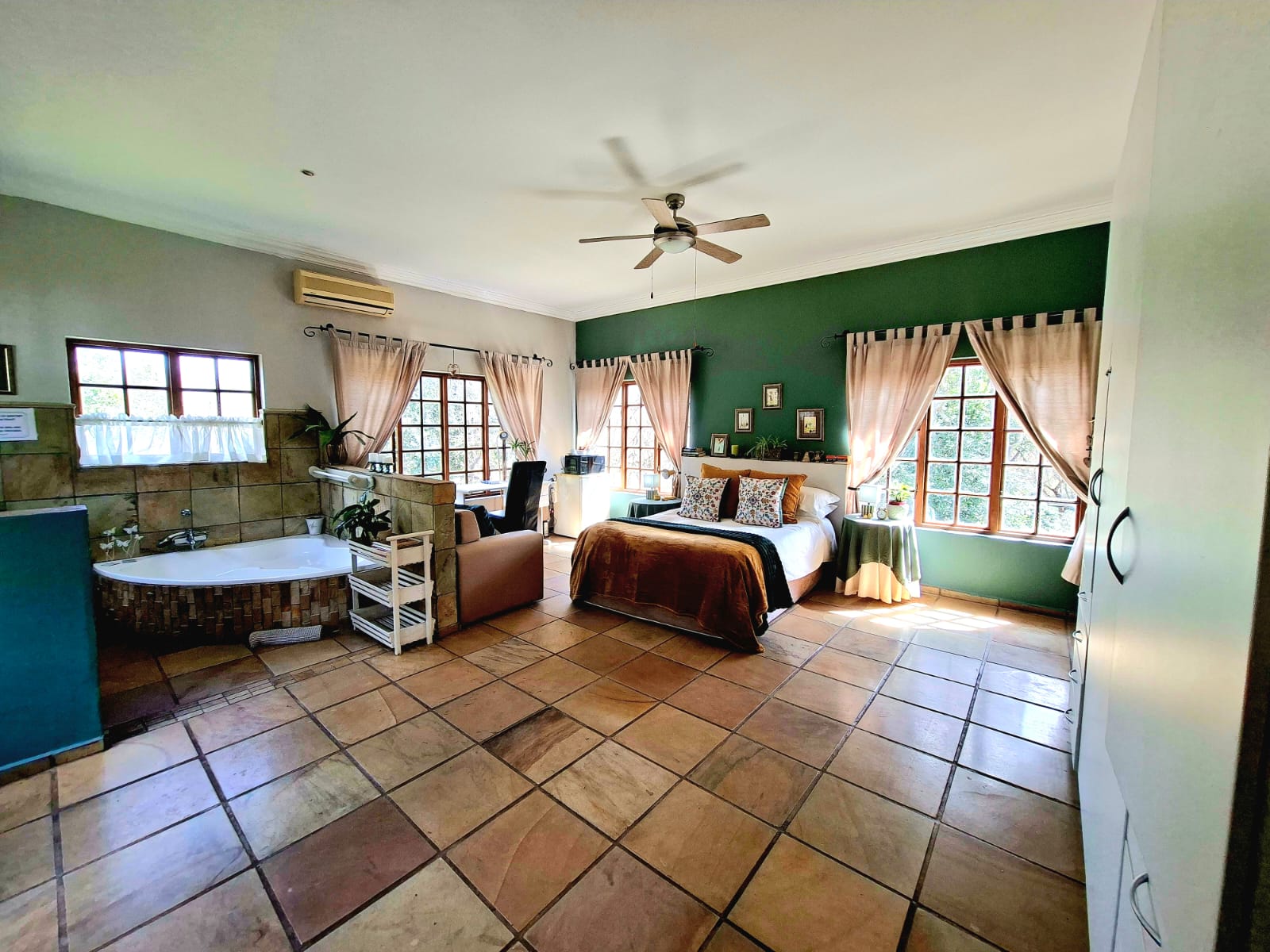 Elderberry Suite with sleeping area and open bath