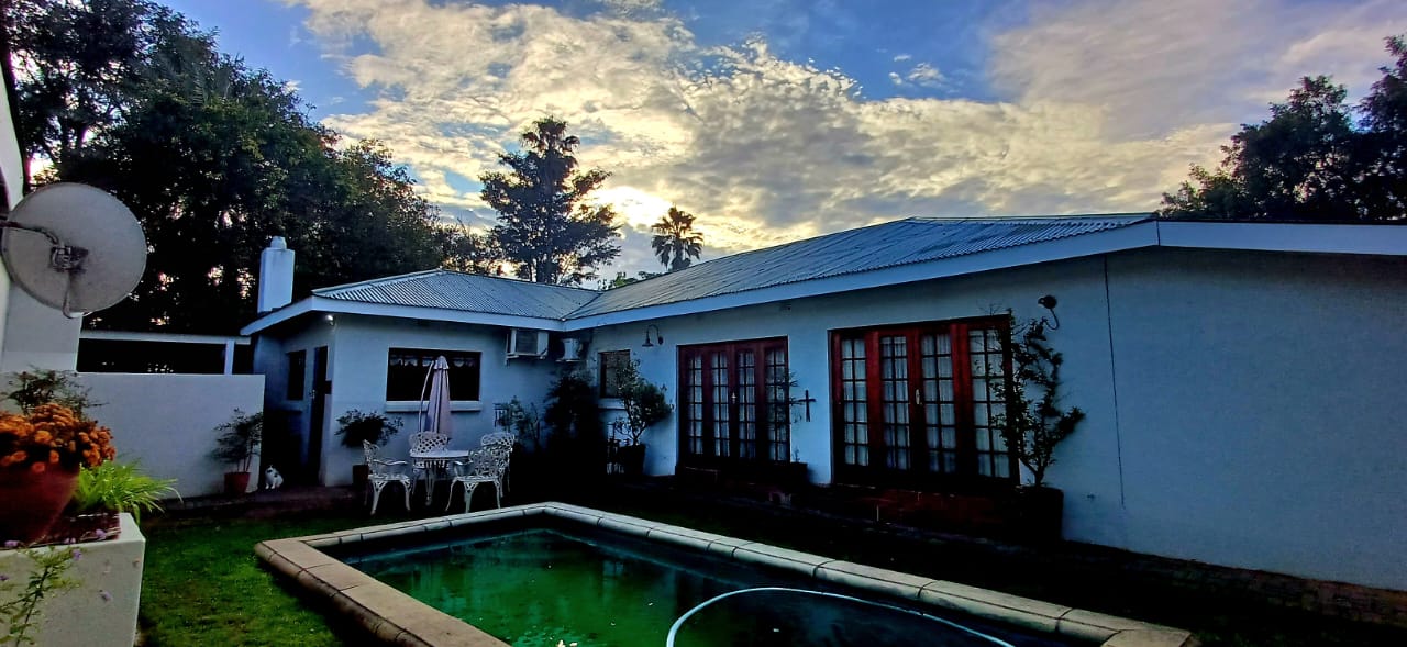 Deo Volente swimming pool at sunset