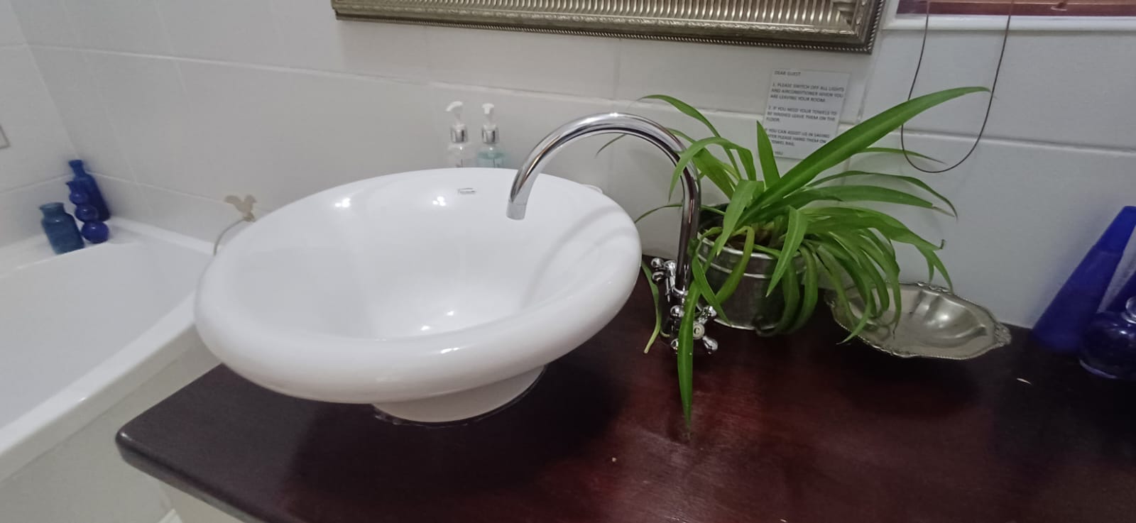 Basin and bath in the Lemon Balm Suite bathroom