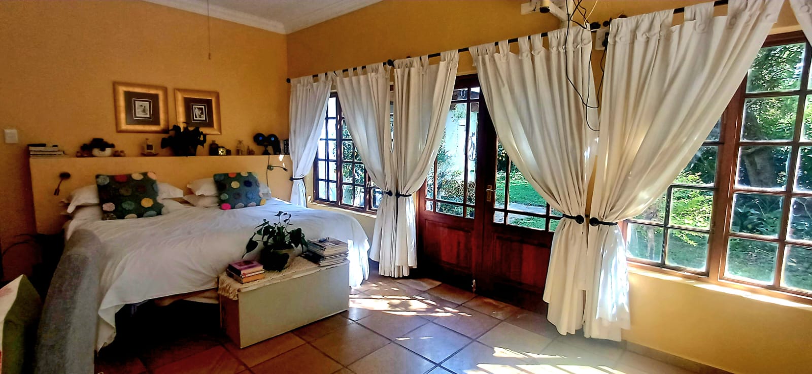 Bedroom view in the Lemon Balm Suite